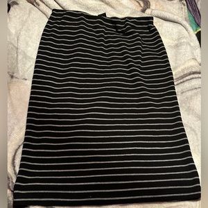 Women’s black striped skirt.